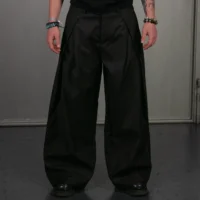 WIDE-LEG PLEATED TROUSERS