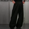 WIDE-LEG PLEATED TROUSERS