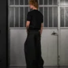 WIDE-LEG PLEATED TROUSERS
