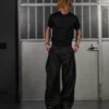 WIDE-LEG PLEATED TROUSERS